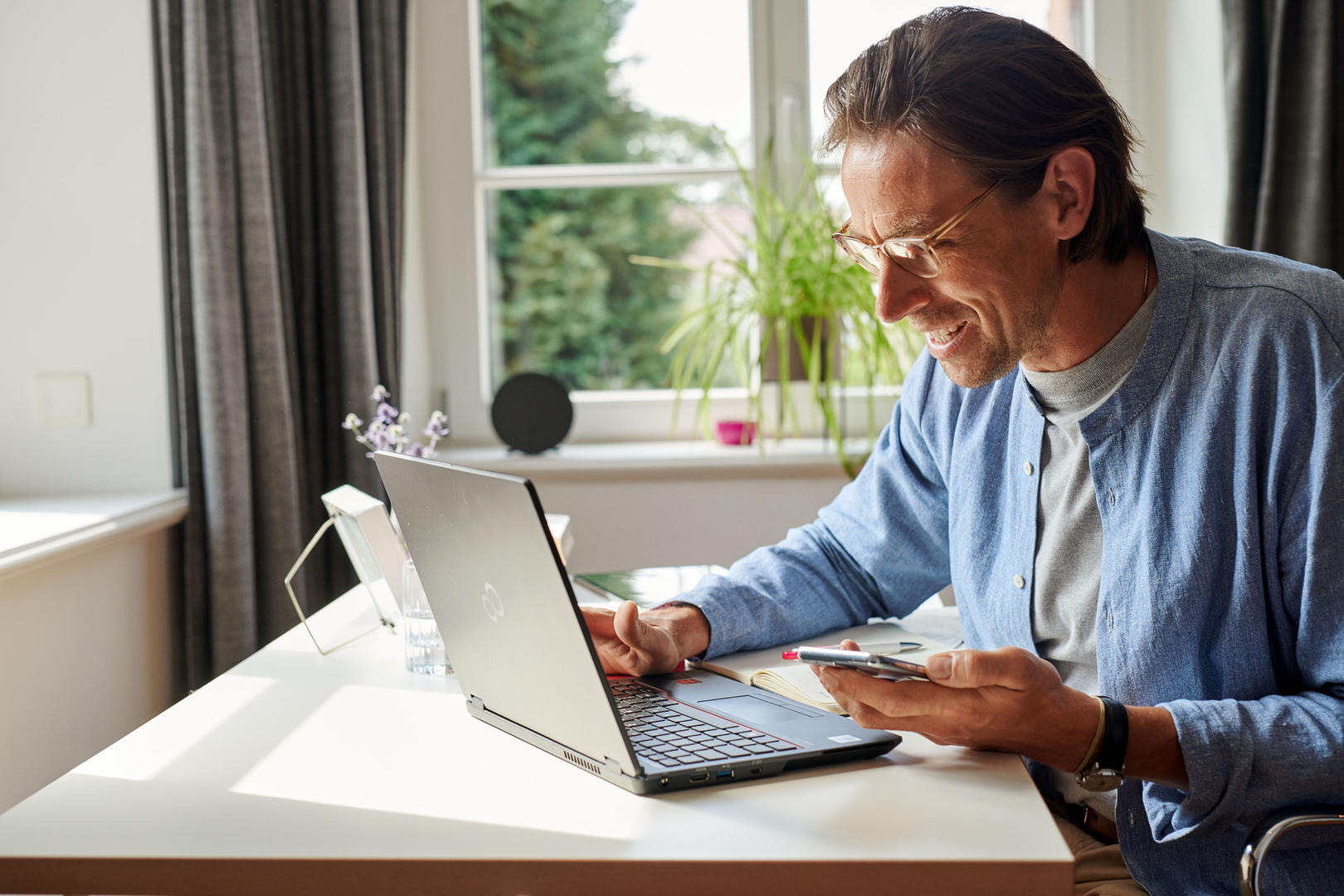 person sitting in front of a computer